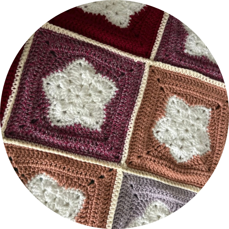 Volunteers helping turn knitted squares into warm, lifesaving blankets for Swindon Big Knit’s community project.