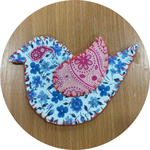 Swindon Big Knit Threads group members with their knitting displayed as part of the community project